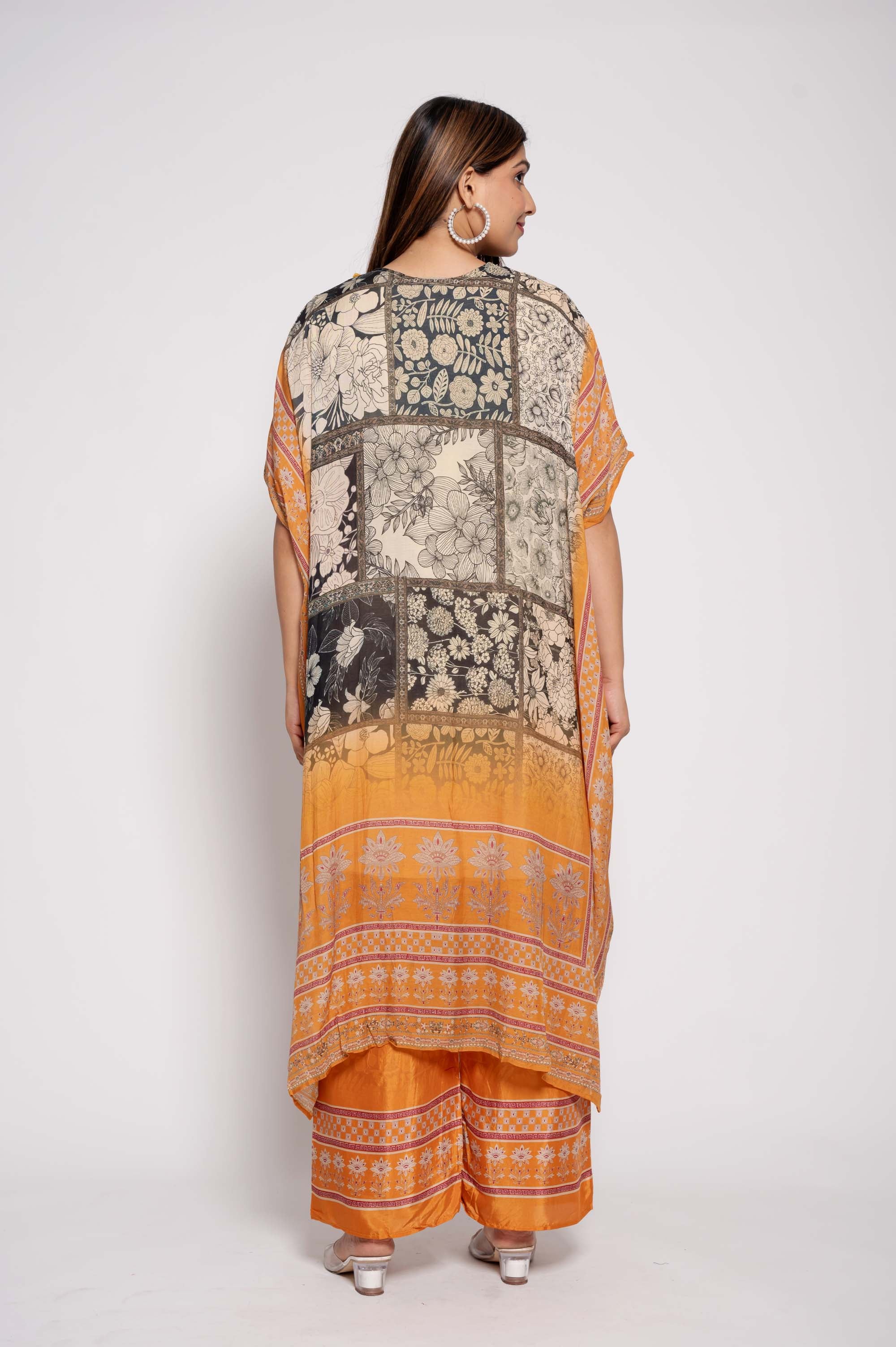 Printed Kurta Set with tasselwork in neckline