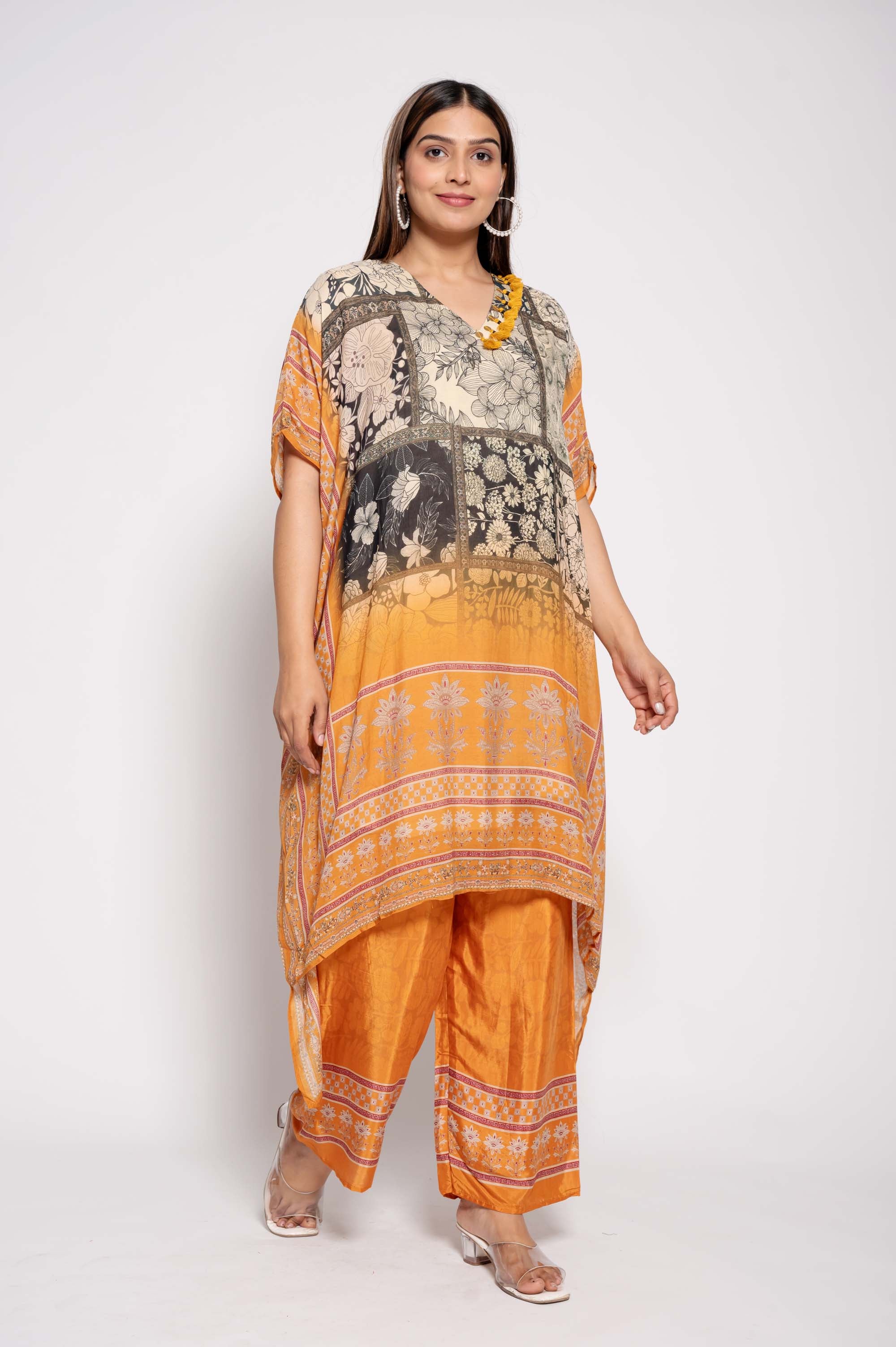 Printed Kurta Set with tasselwork in neckline
