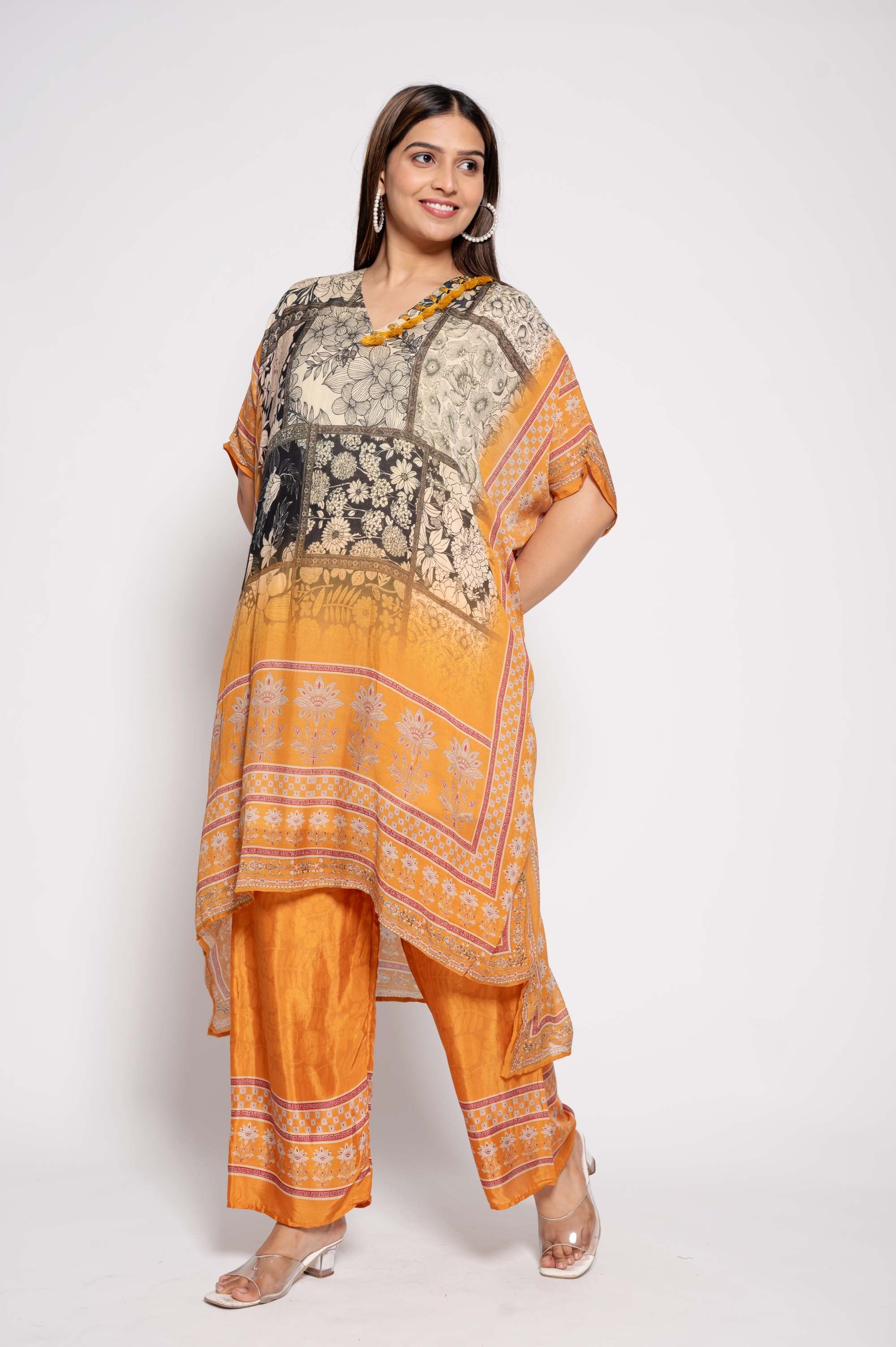 Printed Kurta Set with tasselwork in neckline