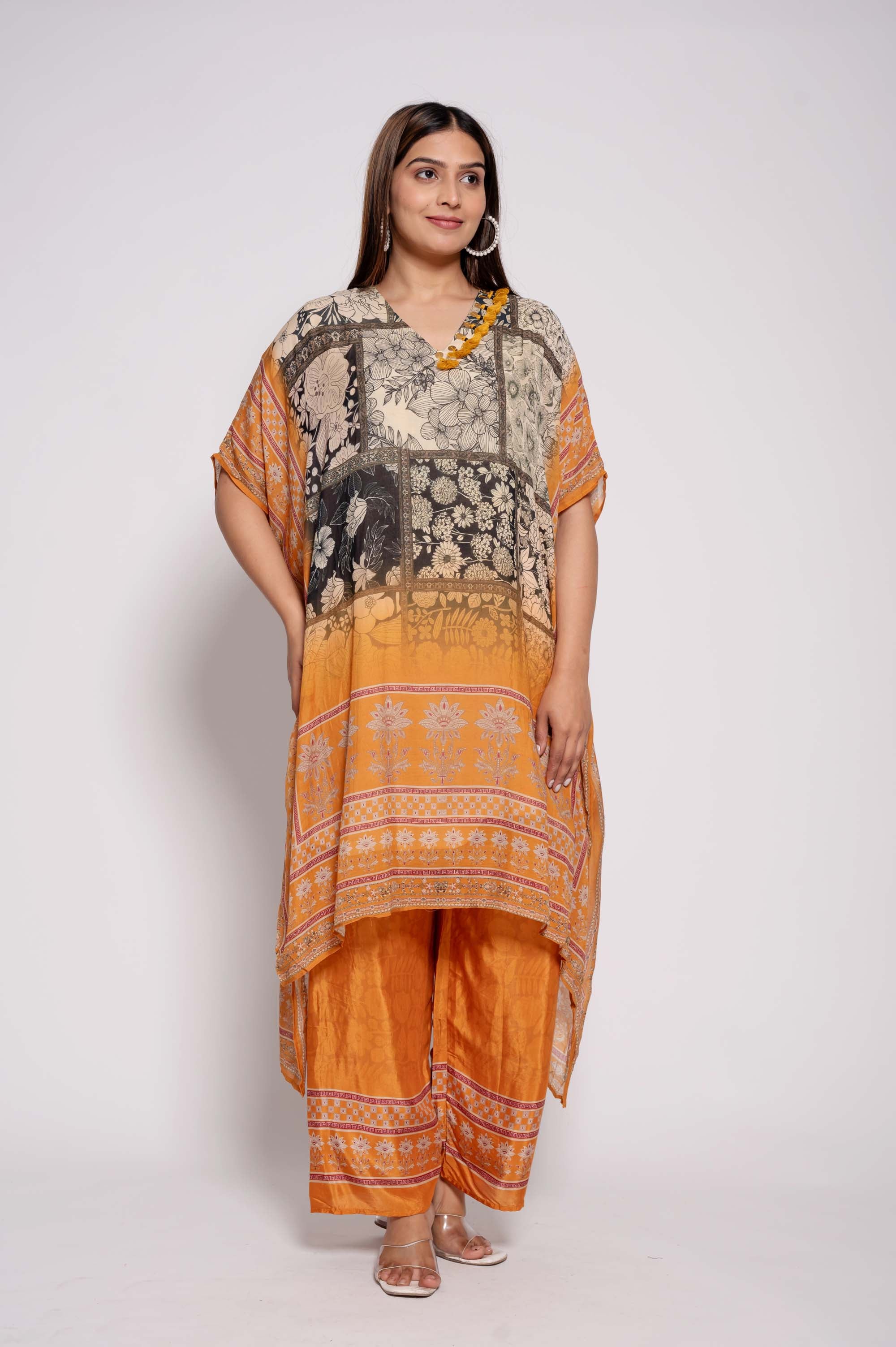 Printed Kurta Set with tasselwork in neckline