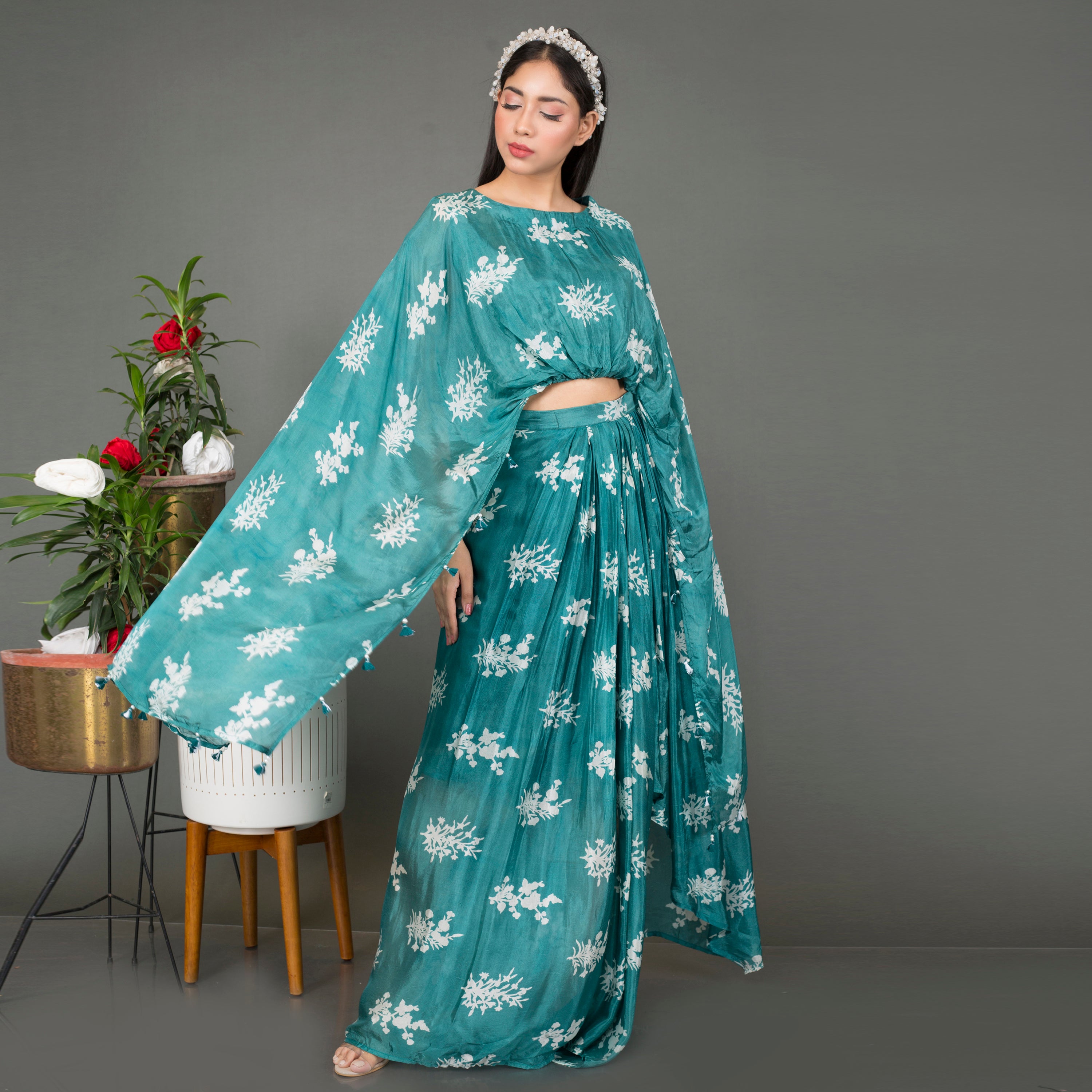 Cape style top with draped skirt