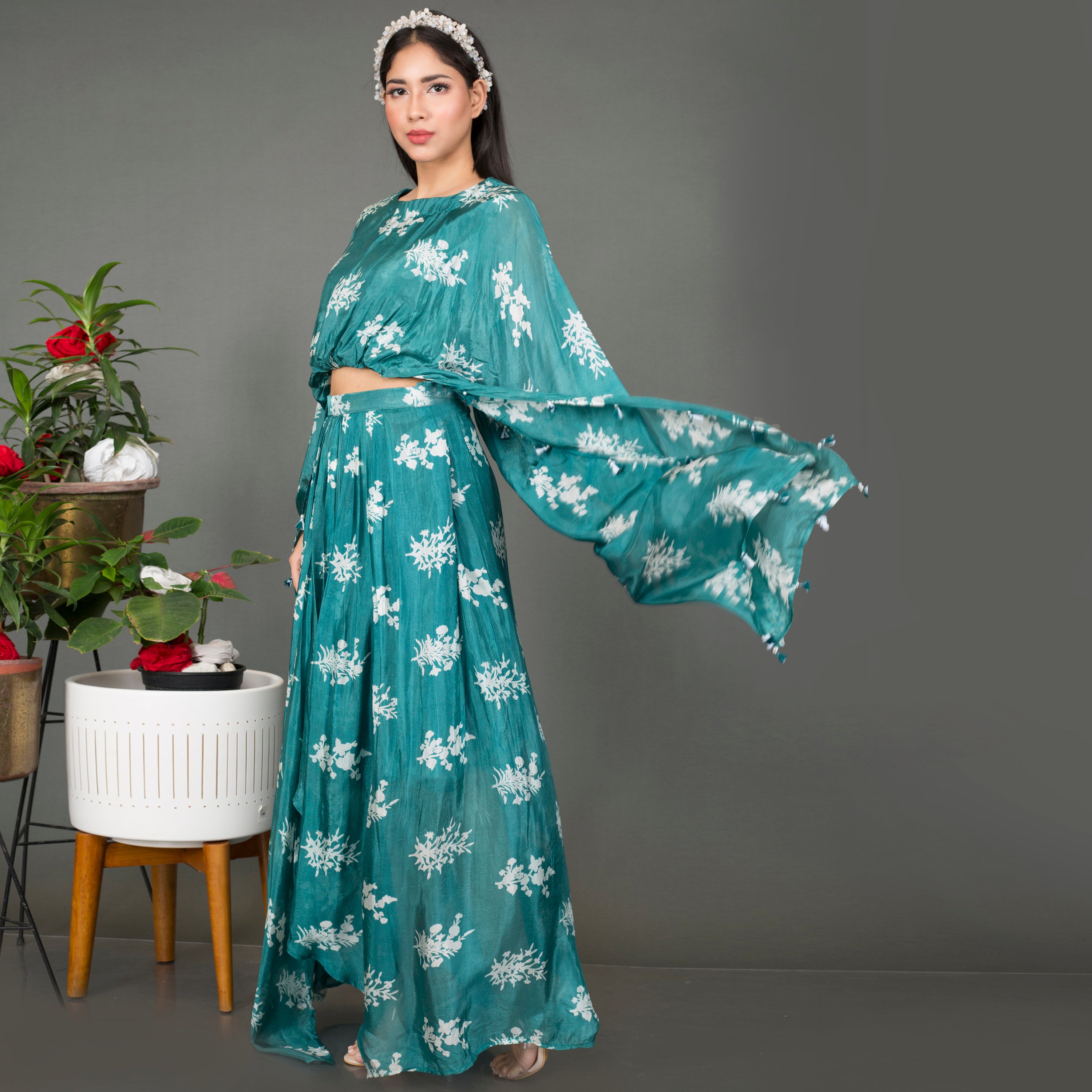 Cape style top with draped skirt