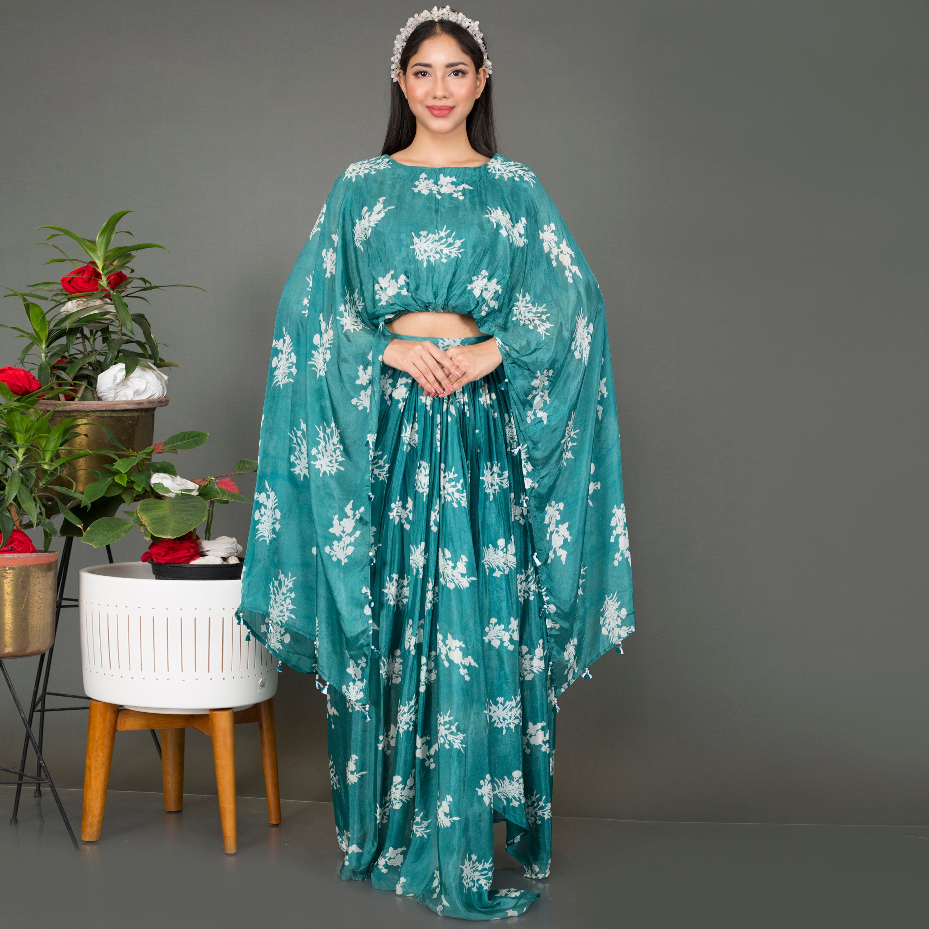 Cape style top with draped skirt