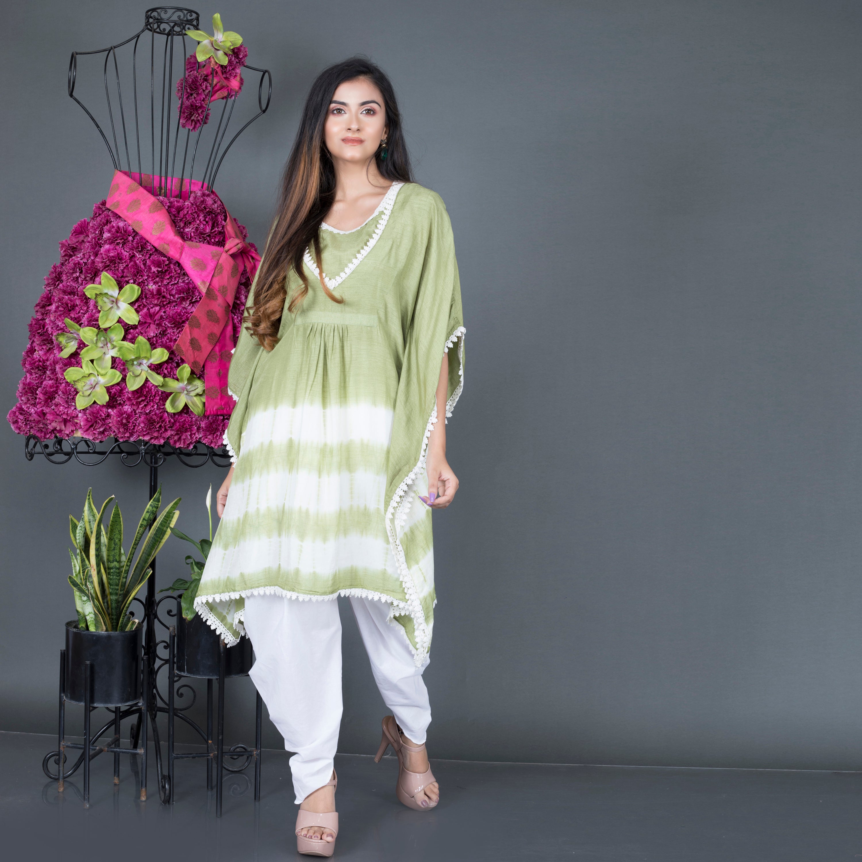 Kaftan kurta paired with dhoti pant