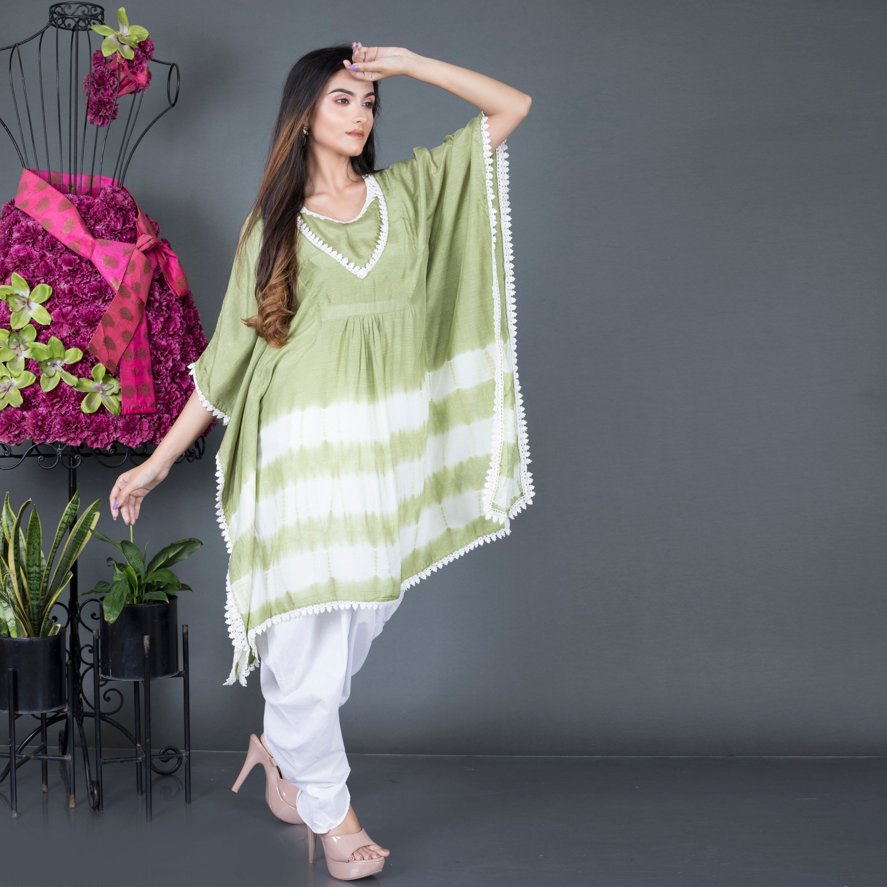 Kaftan kurta paired with dhoti pant