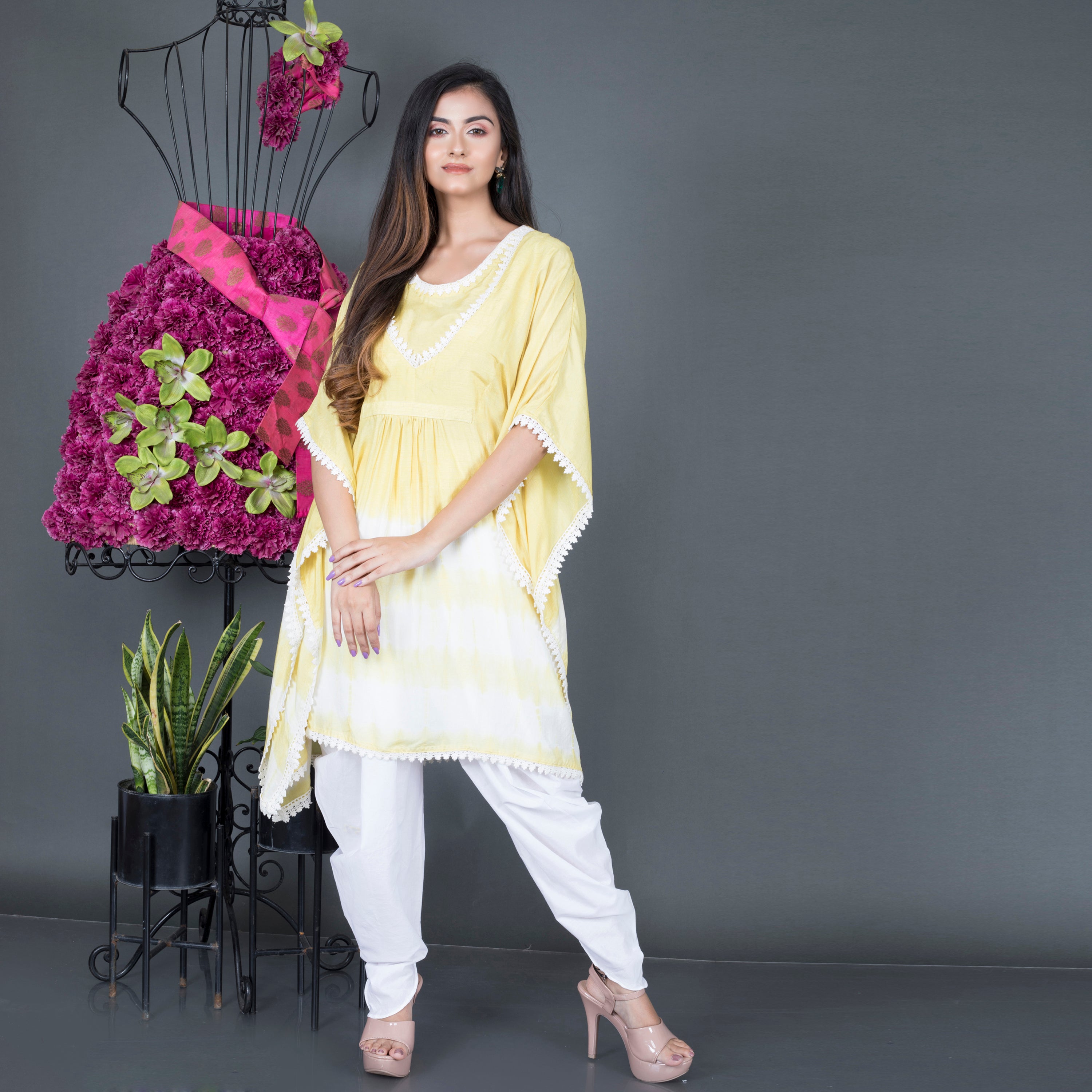 Kaftan kurta paired with dhoti pant