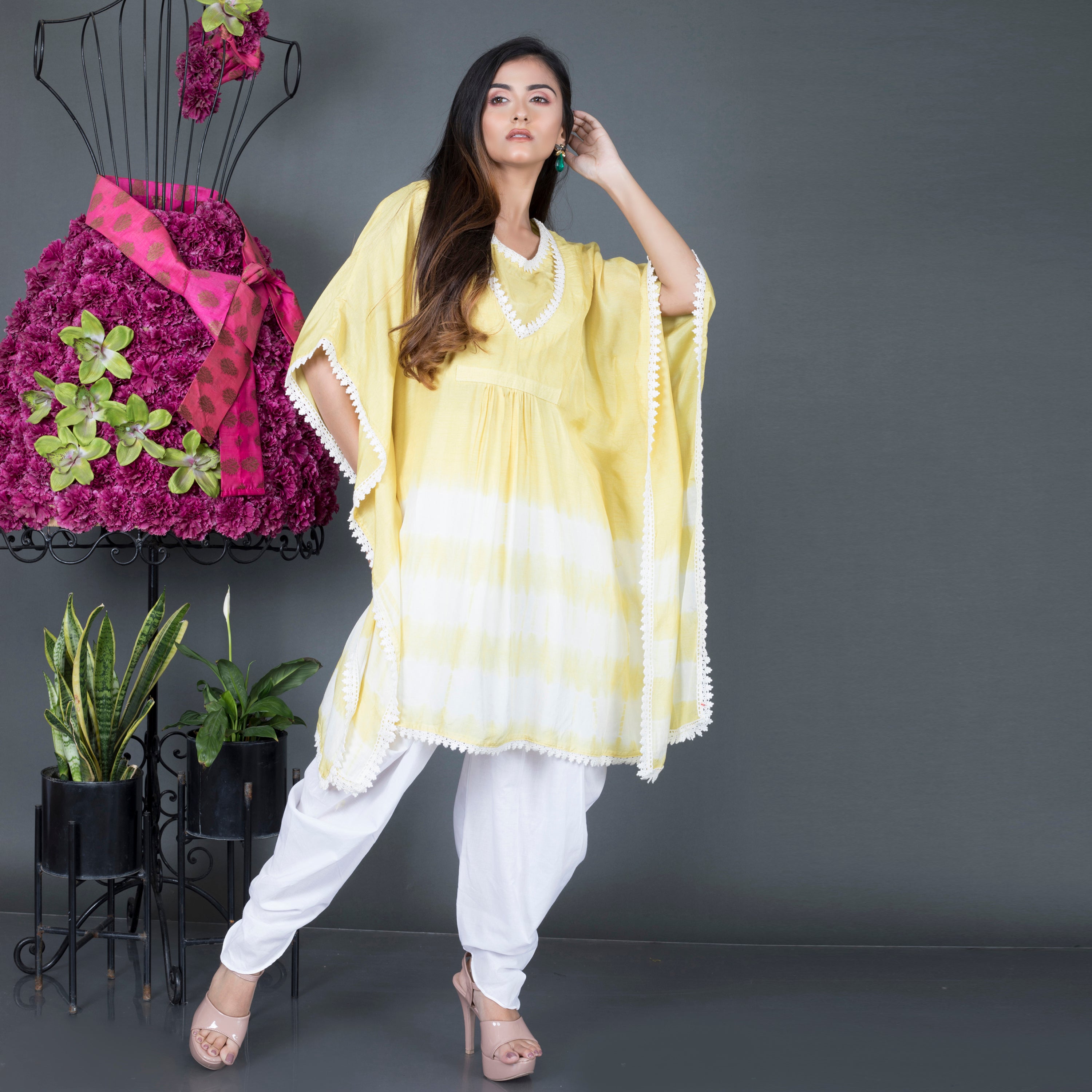 Kaftan kurta paired with dhoti pant