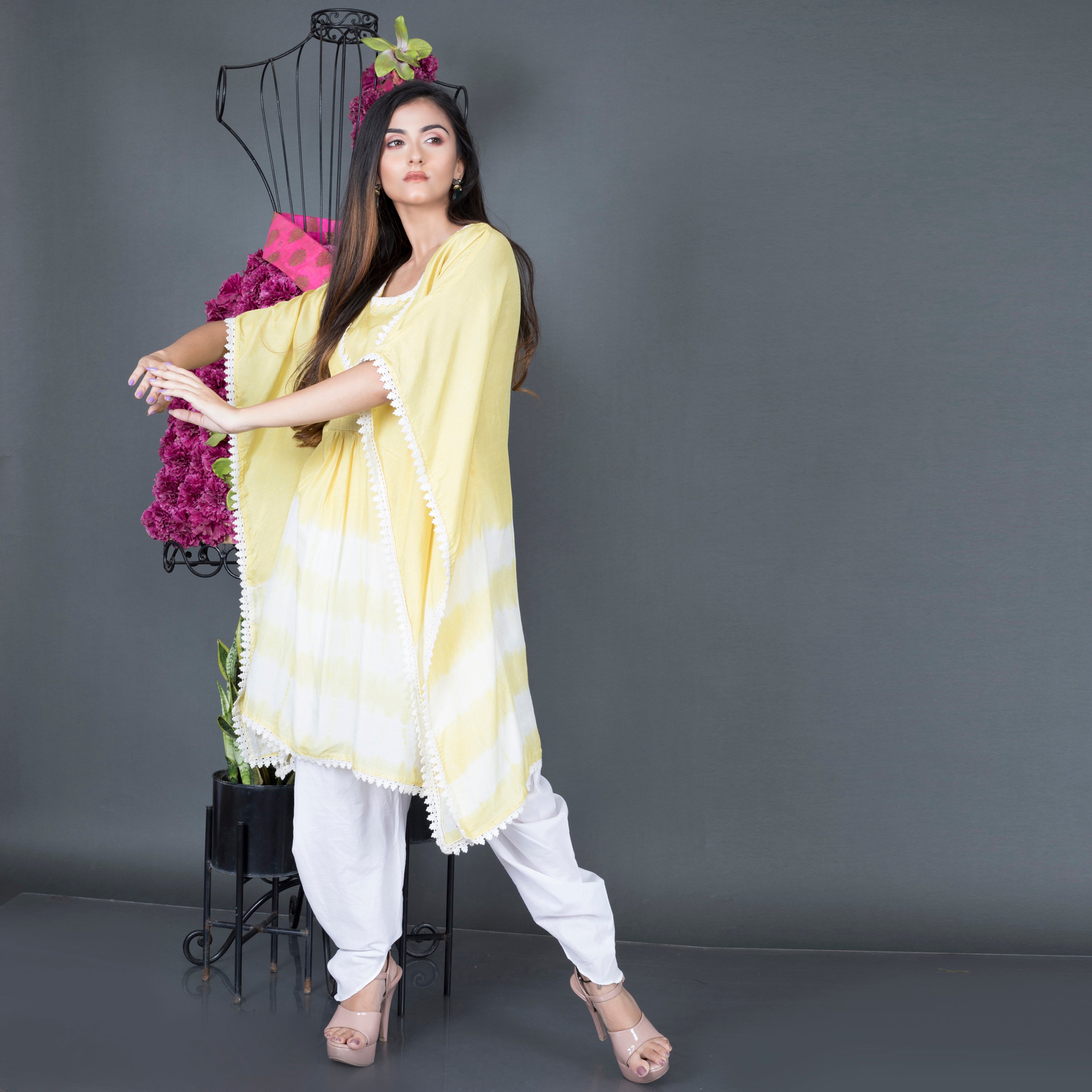 Kaftan kurta paired with dhoti pant