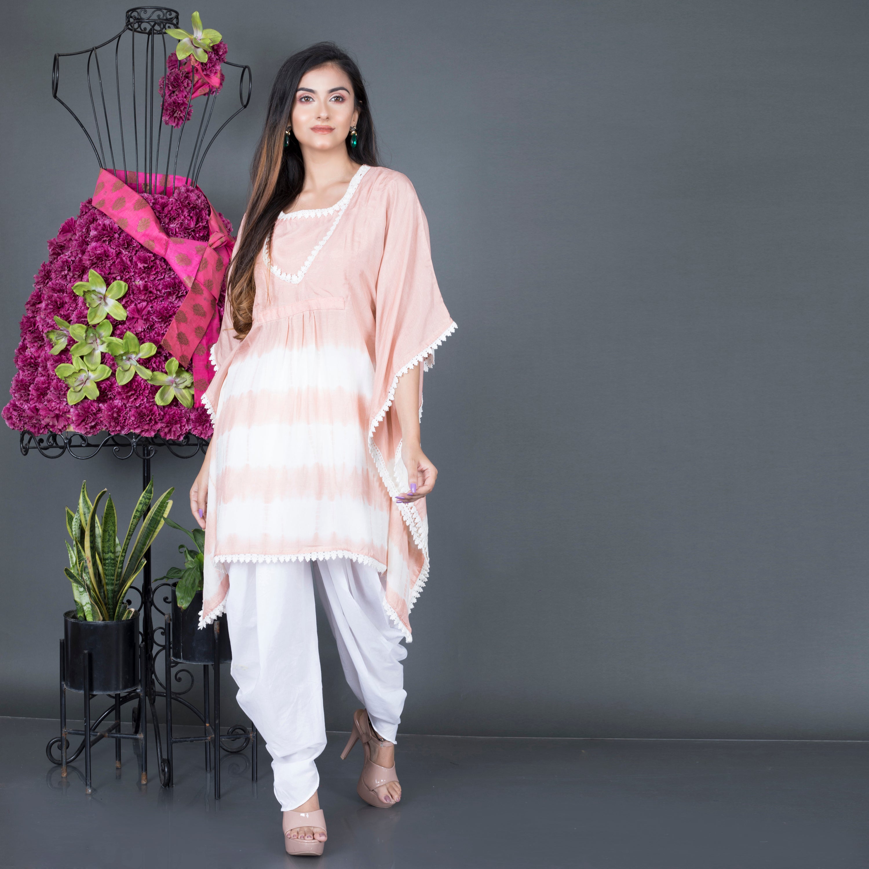 Kaftan kurta paired with dhoti pant