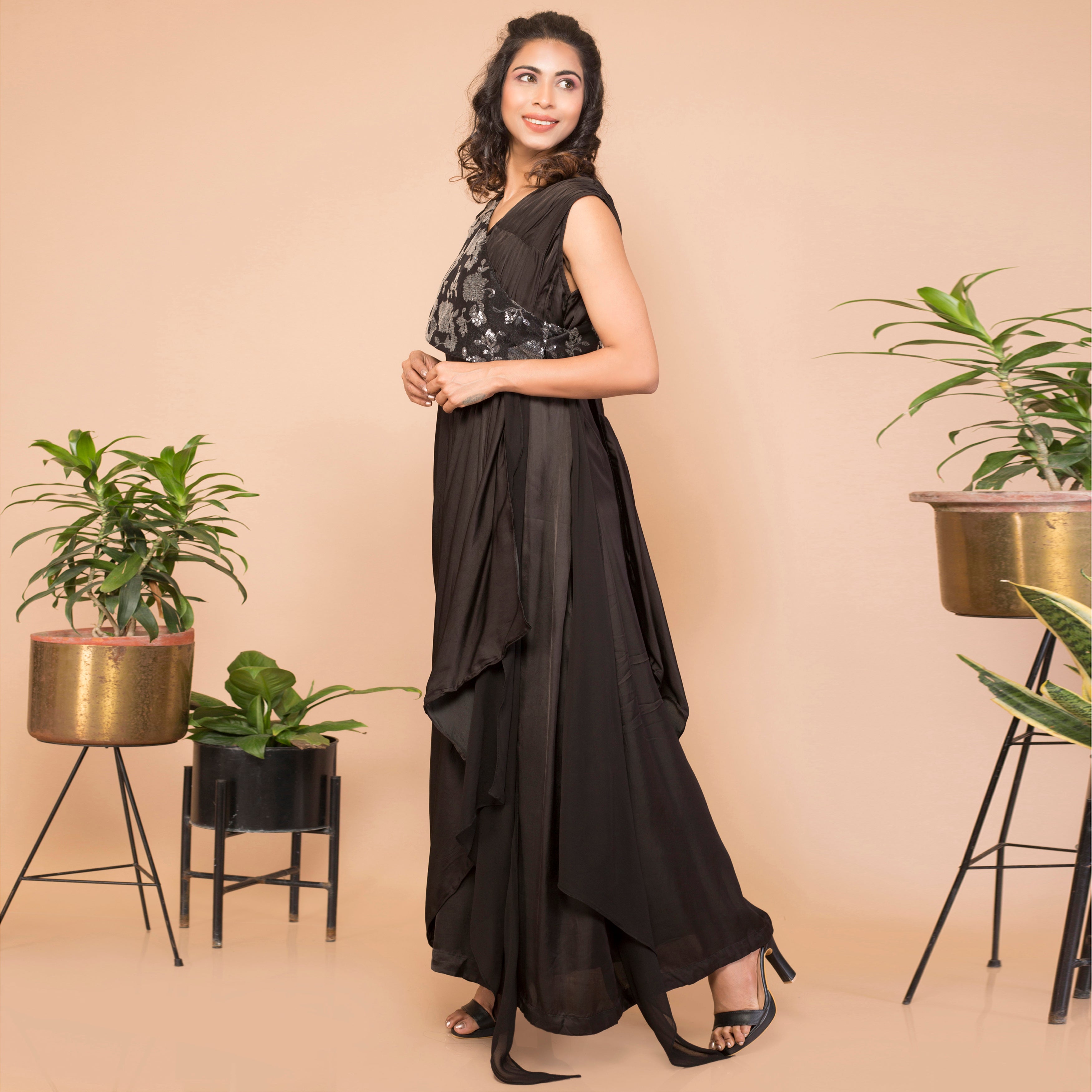 Satin crepe sleeveless draped gown