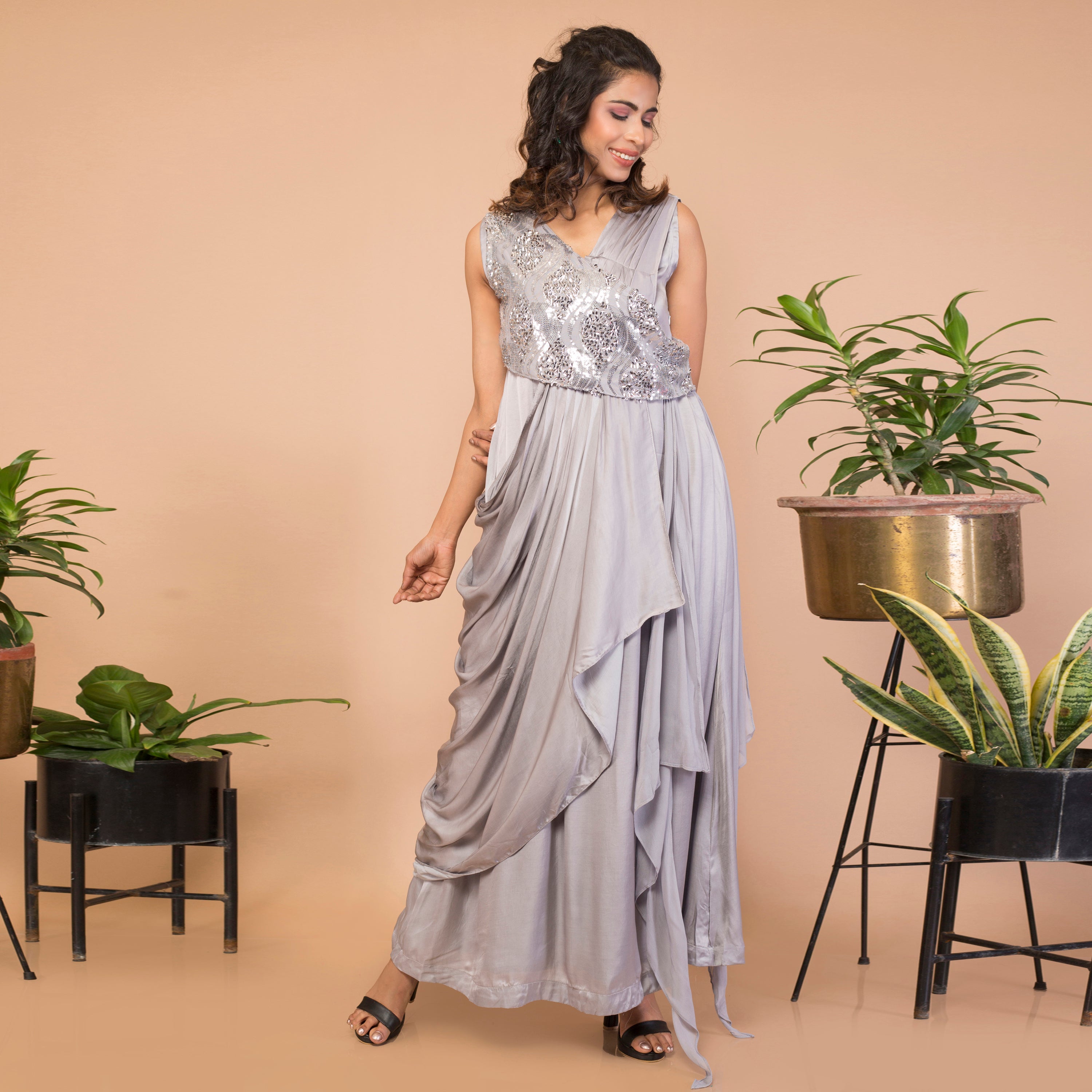 Satin crepe sleeveless draped gown