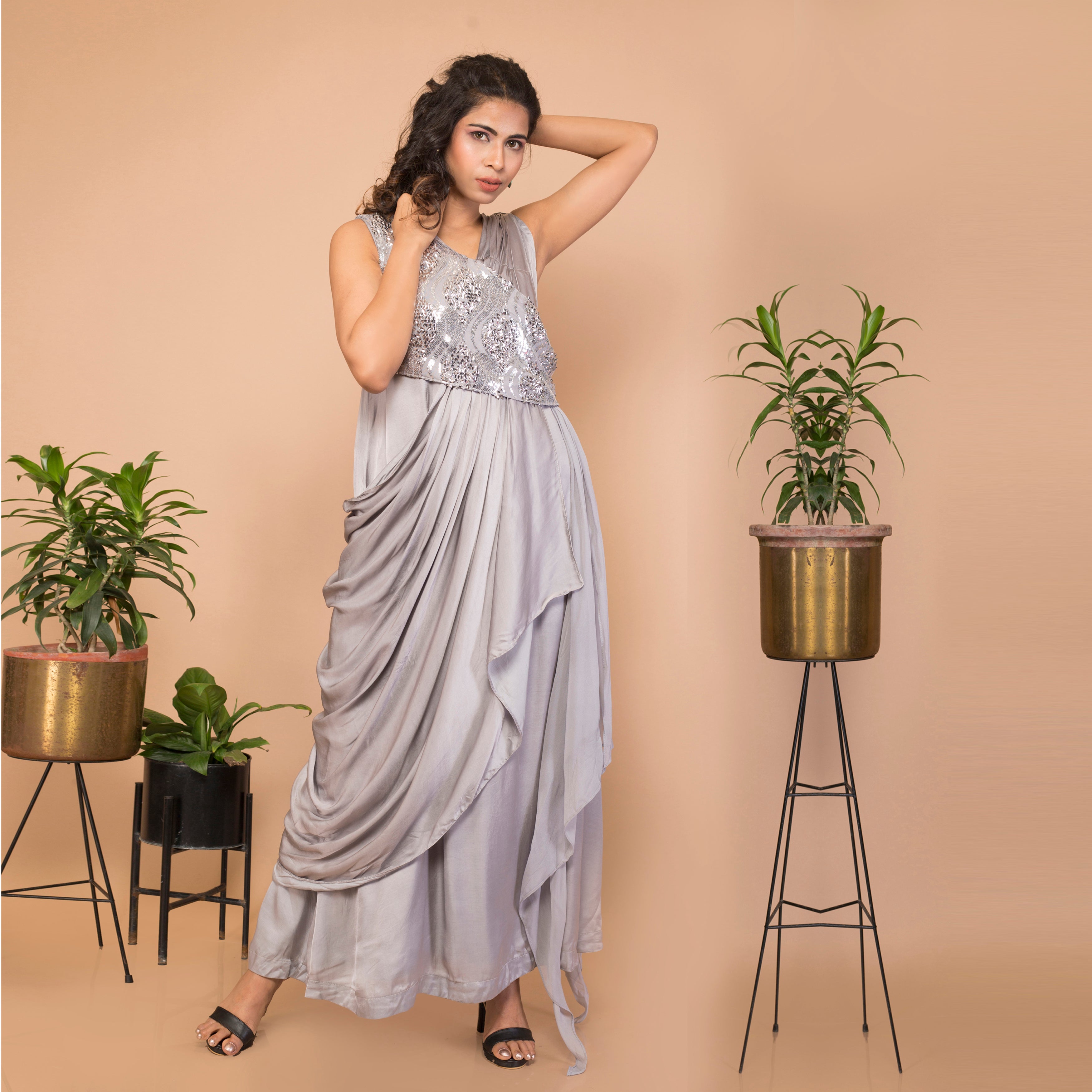 Satin crepe sleeveless draped gown