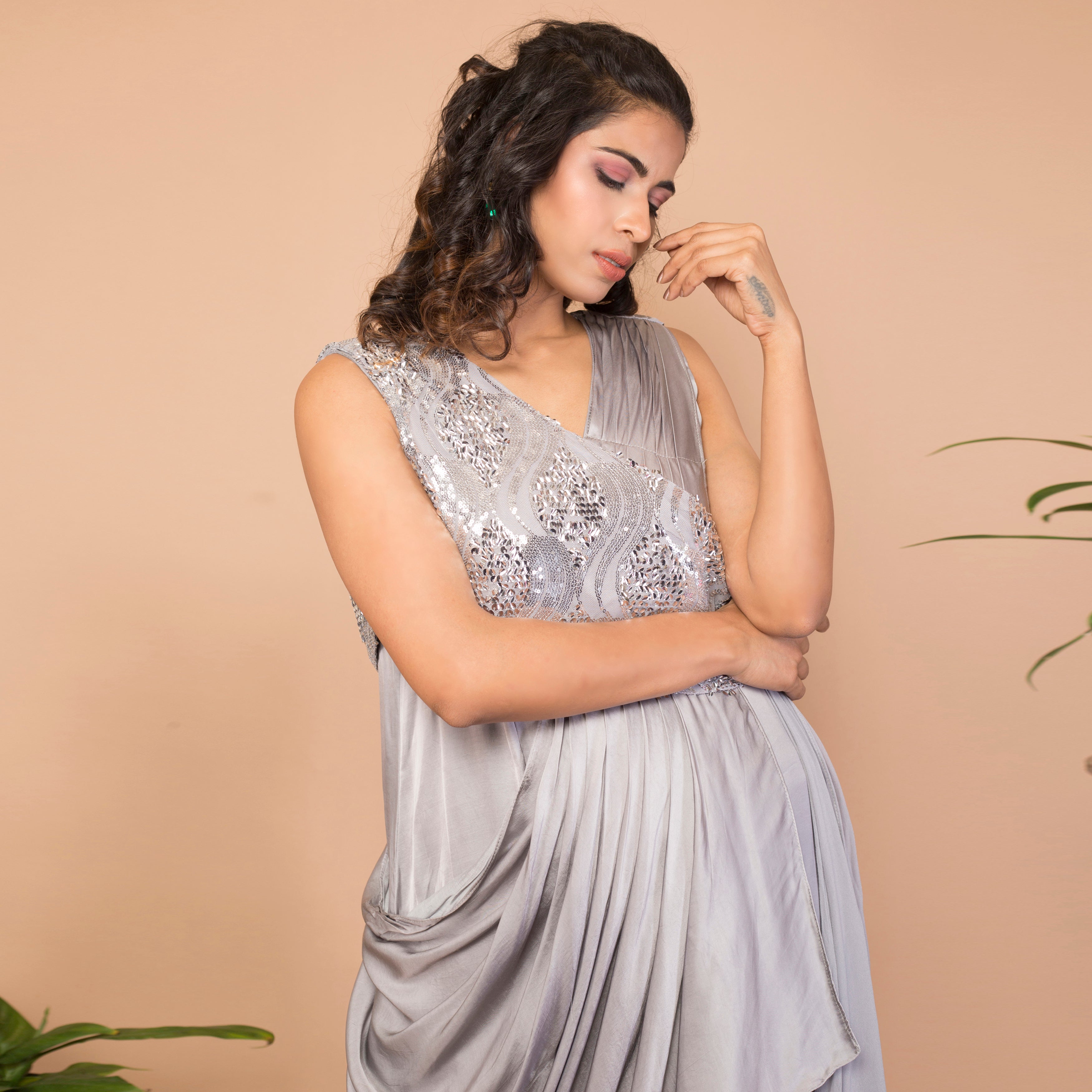 Satin crepe sleeveless draped gown