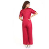 Crepe jumpsuit embellished in gold sequins.