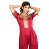 Crepe jumpsuit embellished in gold sequins.